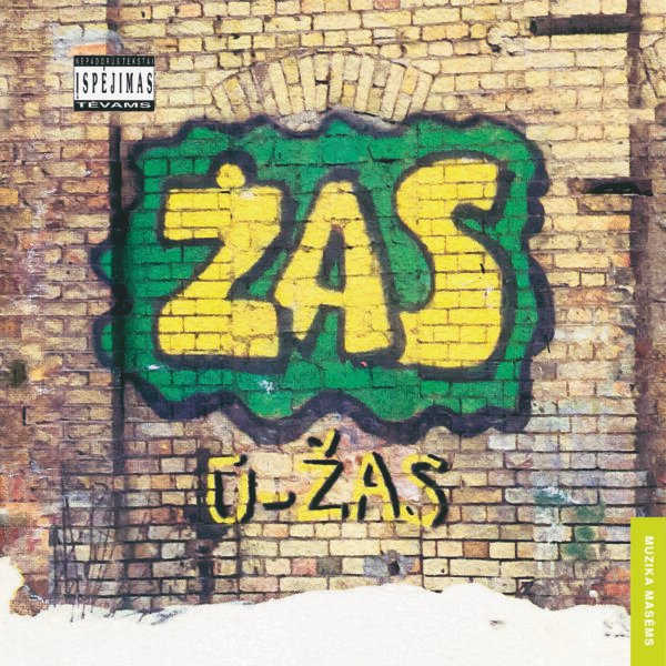 „ŽAS – U-Žas“ albumo viršelis su grafiti stiliaus „ŽAS“ užrašu ant plytų sienos, perteikiantis 90-ųjų hiphopo dvasią.